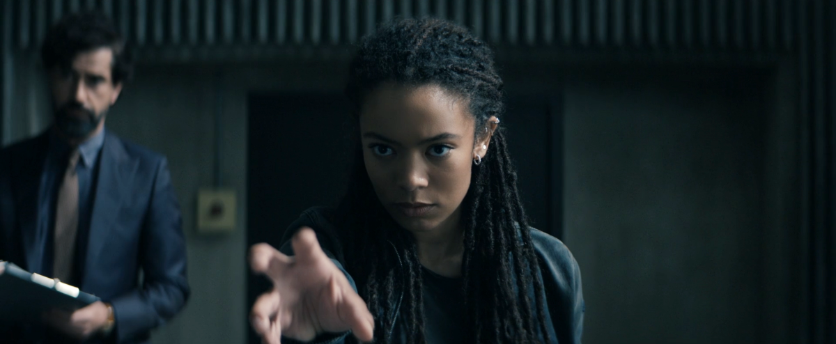 Gen V 204-6 Marie holds her hand up to use her powers